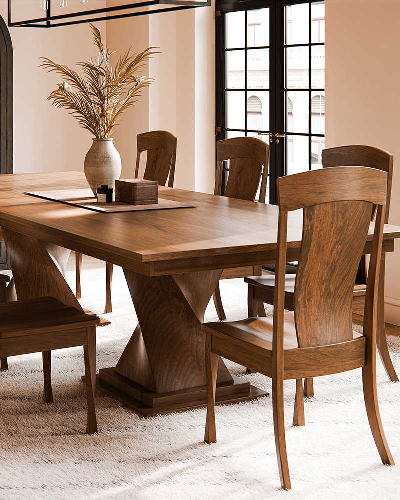 Solid wood dining room furniture with trestle table and matching chairs in bright room